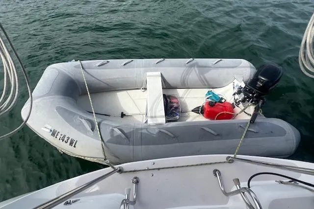 Slide: The Image of Inflatable dinghy moored beside a 2003 Catalina 470 Sloop With Wing Keel. - 19