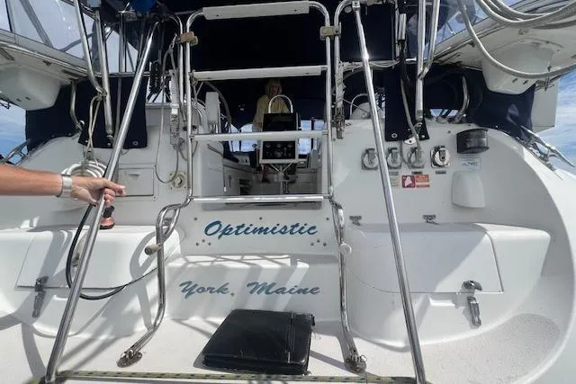 Slide: The Image of 2003 Catalina 470 Sloop with Wing Keel, named "Optimistic," docked in York, Maine. - 42