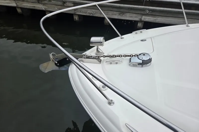 Slide: The Image of Bow of 2007 Sea Ray 320 Sundancer with anchor and railing at dock. - 2