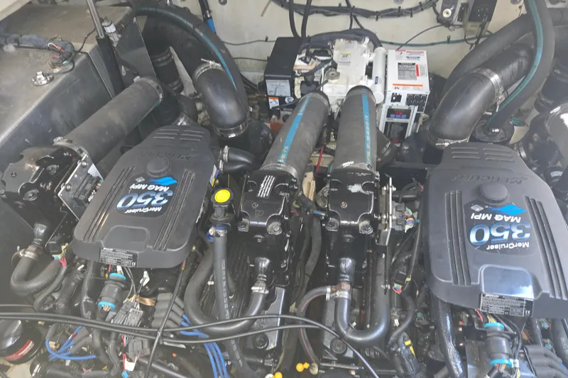 Slide: The Image of Engine compartment of a 2007 Sea Ray 320 Sundancer with twin MerCruiser 350 MPI engines. - 22
