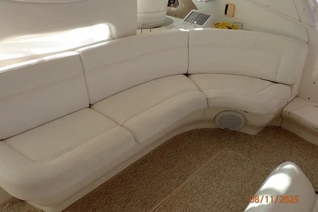 Slide: The Image of White leather seating in 2003 Sea Ray Sundancer 460 yacht interior. - 24