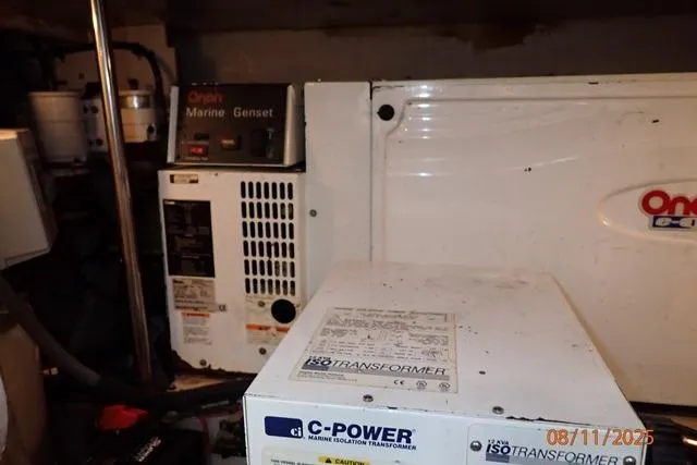 Slide: The Image of Engine room of 2003 Sea Ray Sundancer 460 with Onan marine generator and C-Power transformer. - 39