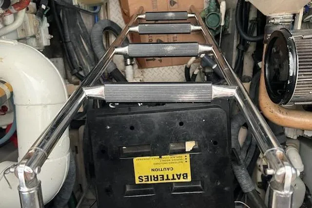 Slide: The Image of Engine room of 2003 Sea Ray Sundancer 460 with ladder and battery compartment. - 40