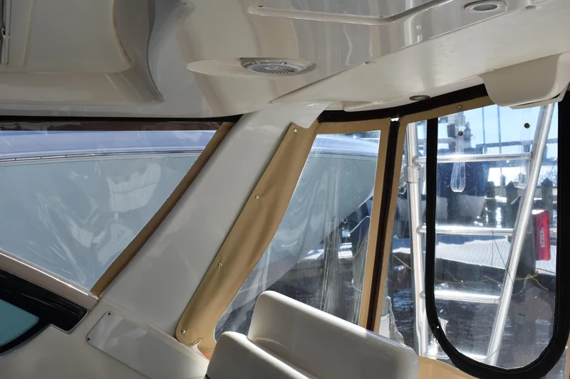 Slide: The Image of Interior view of 2008 Tiara Sport Fish boat with large windows and seating. - 22
