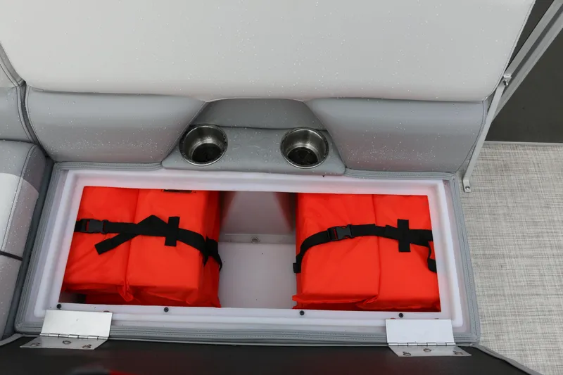 Slide: The Image of Storage compartment with life jackets in 2025 SunCatcher Select 18C boat. - 11