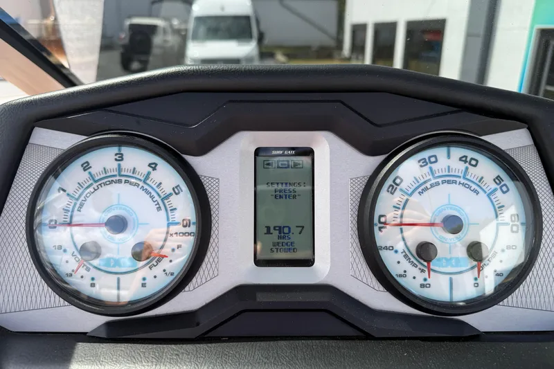 Slide: The Image of Dashboard of 2021 Axis T23 boat showing RPM and speed gauges. - 35