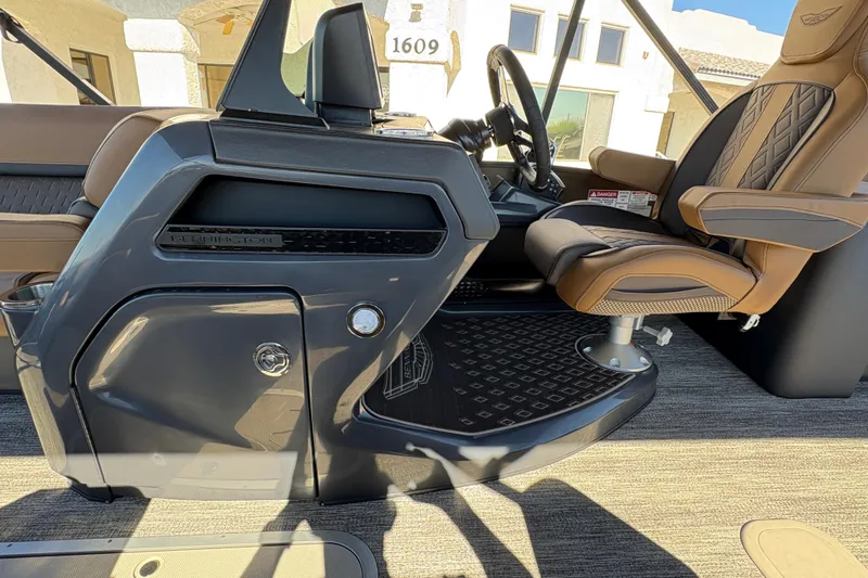 Slide: The Image of 2026 Bennington 24 MSL boat dashboard with steering wheel and digital displays. - 20