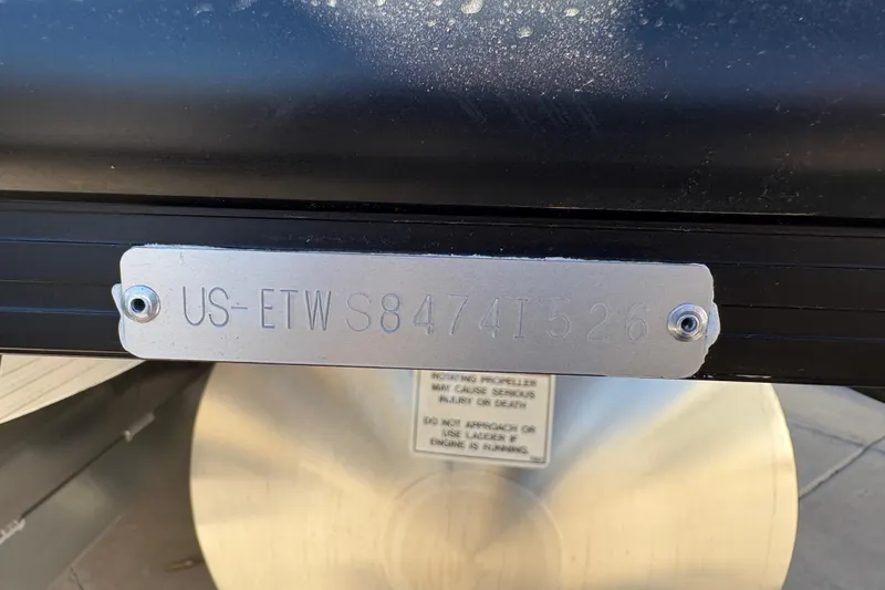 Slide: The Image of Open storage compartment on 2026 Bennington 24 MSL boat, featuring sleek design and durable materials. - 24