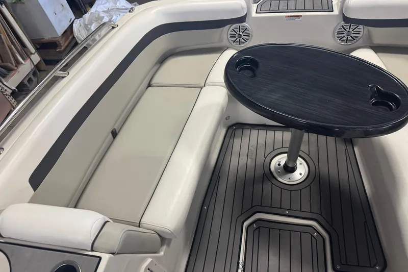 Slide: The Image of 2023 Starcraft SVX 191 OB boat interior with seating and table. - 6