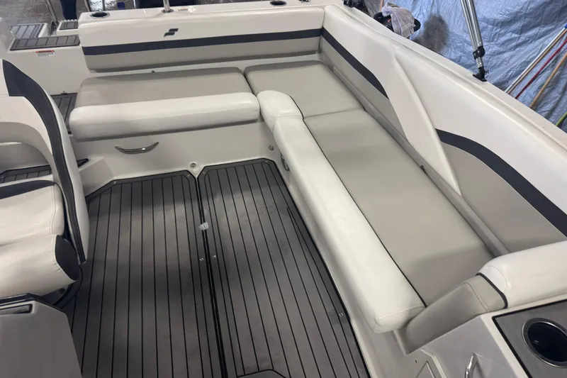 Slide: The Image of 2023 Starcraft SVX 191 OB boat interior with gray seating and flooring. - 9