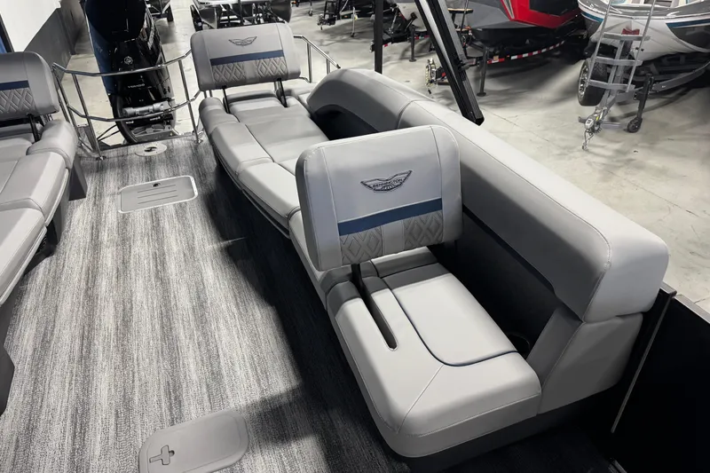 Slide: The Image of 2026 Bennington 24 MSL pontoon boat interior with luxurious seating and modern design. - 13