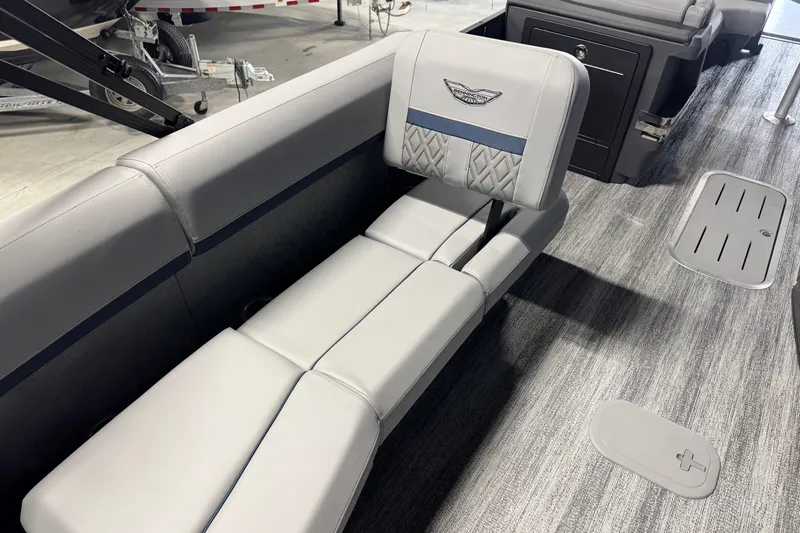 Slide: The Image of 2026 Bennington 24 MSL boat interior with luxurious seating and modern design. - 14