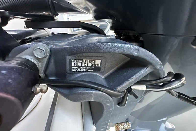 Slide: The Image of Close-up of Yamaha LF115XB engine part on 2021 World Cat 230 SD boat. - 104