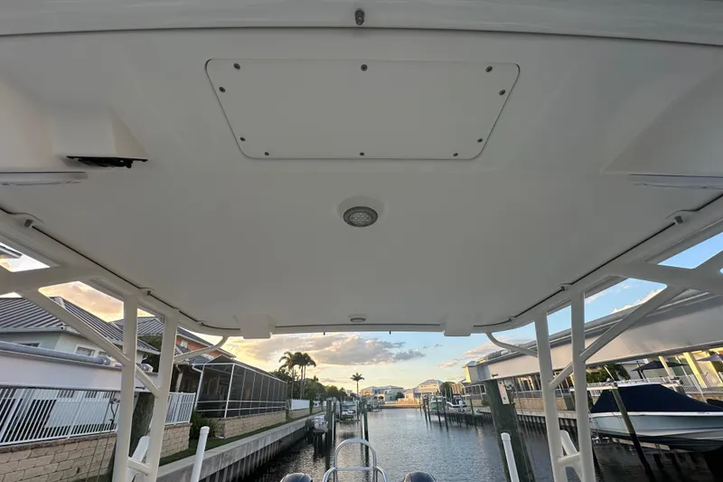 Slide: The Image of 2021 World Cat 230 SD boat interior view with canal backdrop. - 49