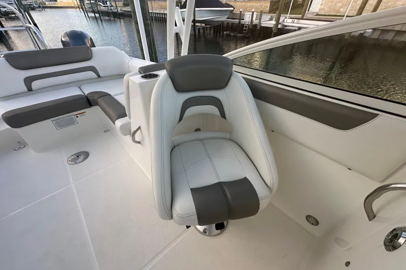 Slide: The Image of 2021 World Cat 230 SD boat interior with comfortable seating and sleek design. - 56