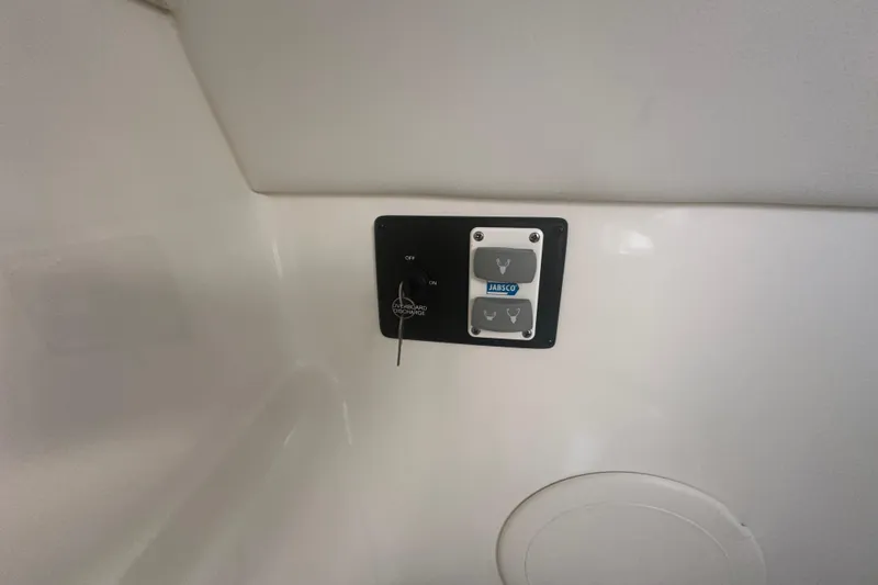 Slide: The Image of Control panel on a 2021 World Cat 230 SD boat interior. - 75