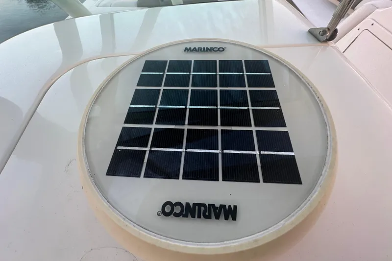 Slide: The Image of Solar panel on 2021 World Cat 230 SD boat deck, featuring Marinco branding. - 76
