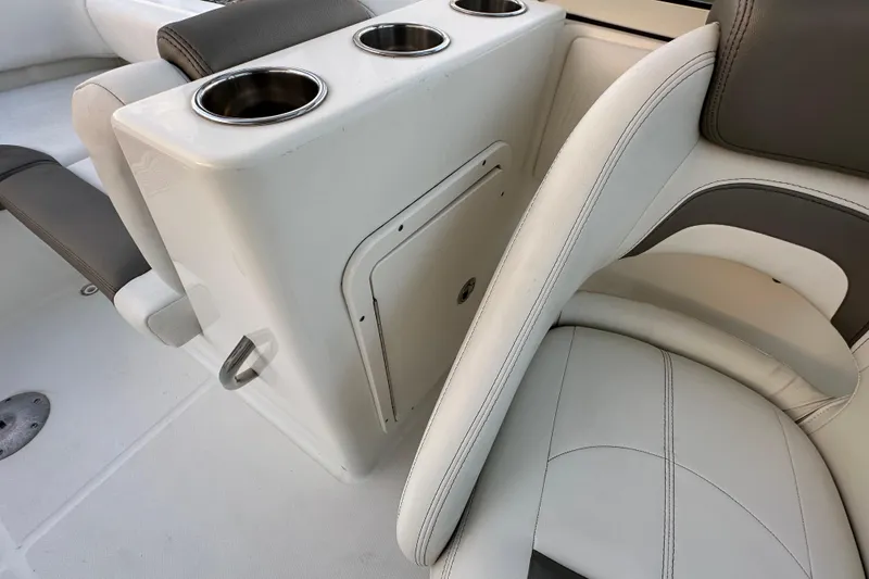Slide: The Image of Interior of 2021 World Cat 230 SD boat with cup holders and seating. - 79
