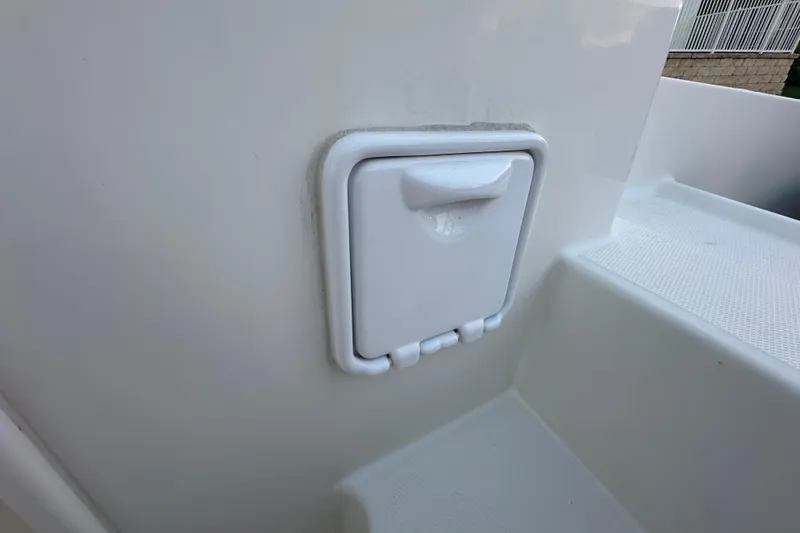 Slide: The Image of White hatch on 2021 World Cat 230 SD boat deck. - 91