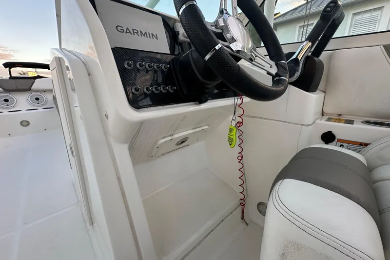 Slide: The Image of Interior of 2021 World Cat 230 SD boat with Garmin navigation system. - 95