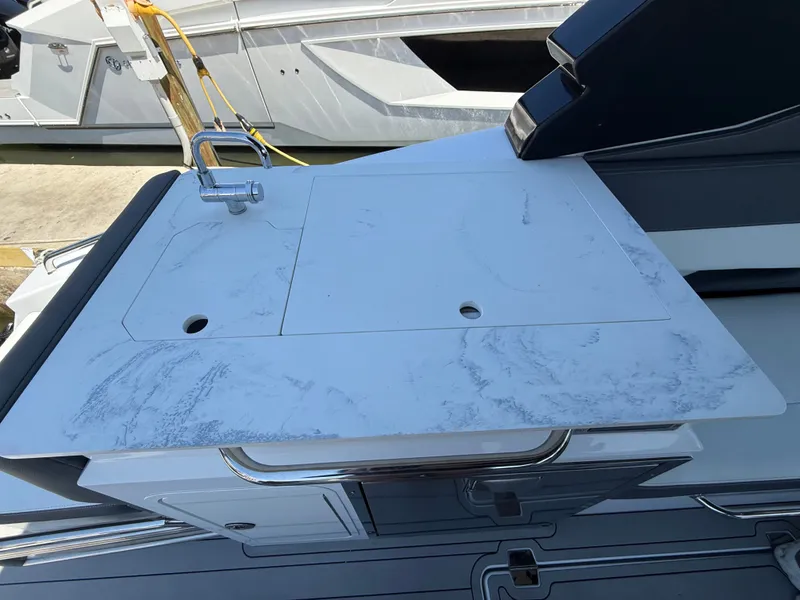 Slide: The Image of 2022 Cruisers Yachts 34 GLS OB with sleek countertop. - 49