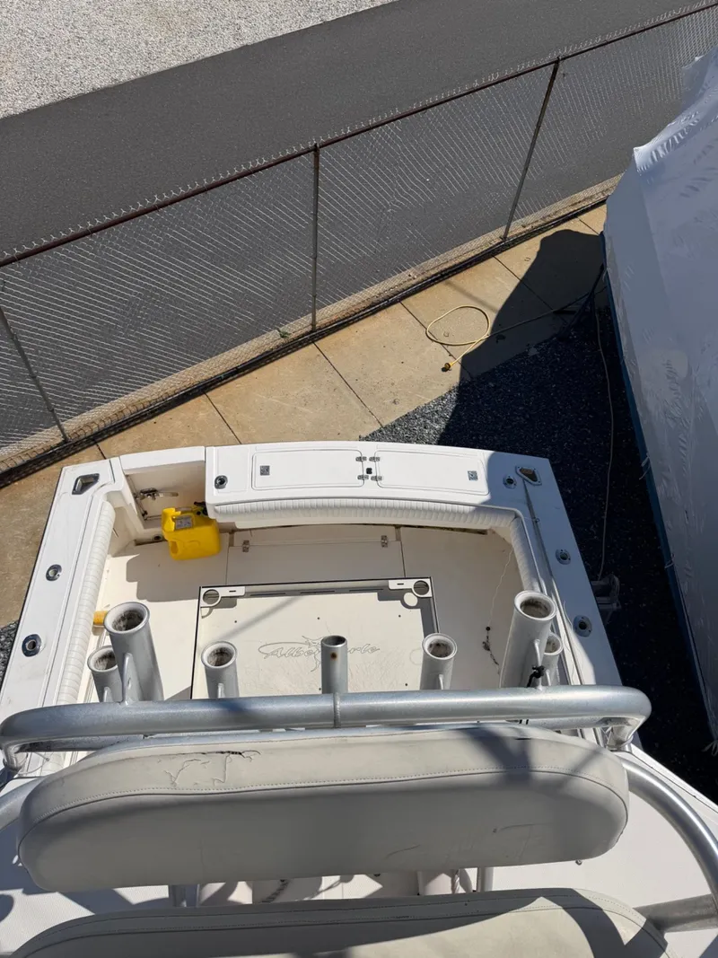 Slide: The Image of Albemarle 305 Express Fisherman 2002, boat deck view with fishing rod holders. - 17
