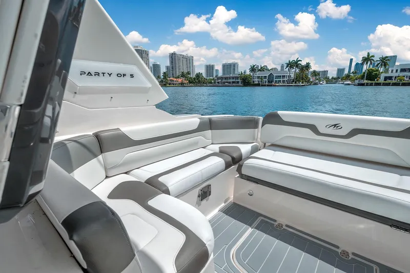 Slide: The Image of 2014 Monterey 320 Sport Yacht interior with waterfront cityscape view. - 15