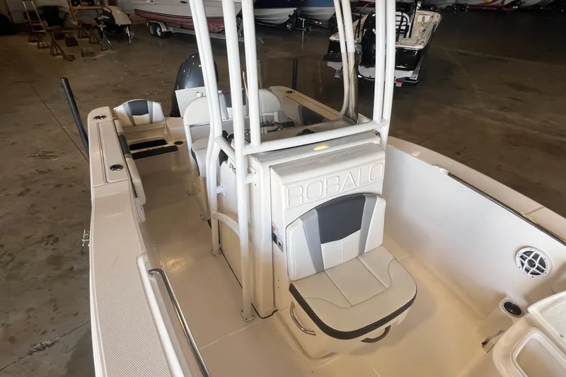 Slide: The Image of 2023 Robalo R200 Center Console boat interior with seating and console details. - 13