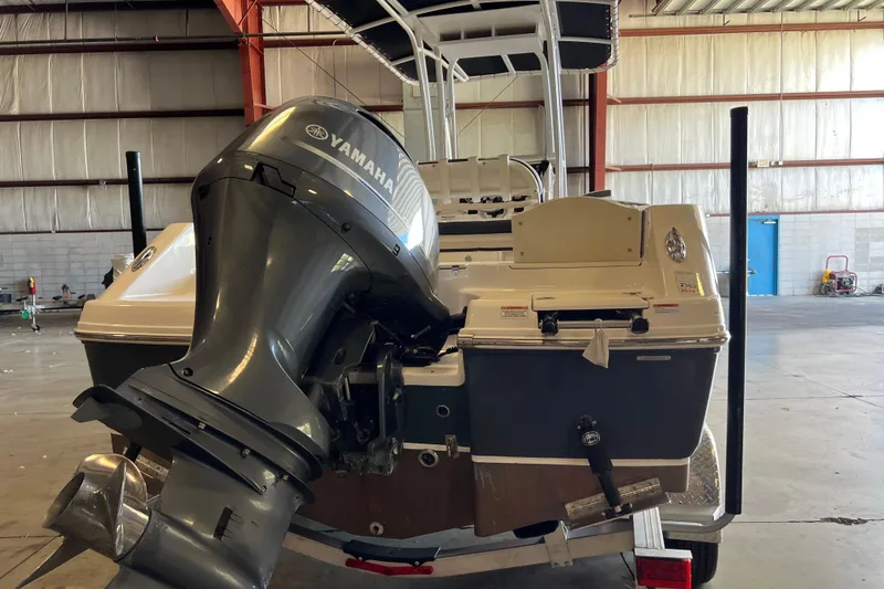 Slide: The Image of 2023 Robalo R200 Center Console boat with Yamaha outboard motor in warehouse. - 7