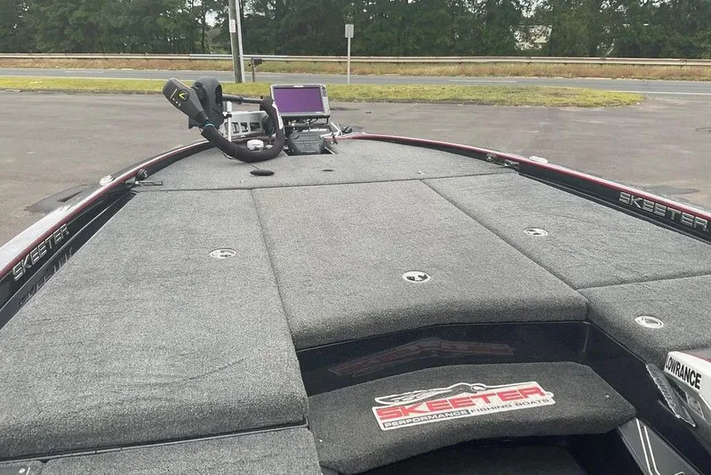 Slide: The Image of 2017 Skeeter FX21 LE boat deck with fishing equipment and control panel. - 24