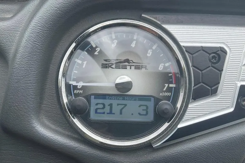 Slide: The Image of 2017 Skeeter FX21 LE tachometer showing 217.3 engine hours. - 25