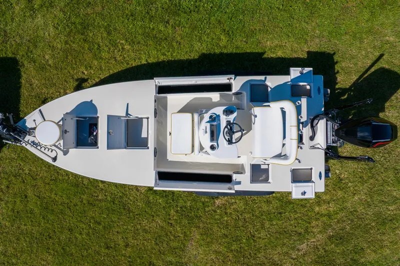 Slide: The Image of Overhead view of 2008 Lake & Bay Boca Grande 20 boat on grass. - 10