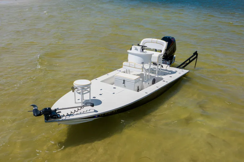 Slide: The Image of 2008 Lake & Bay Boca Grande 20 boat on calm water, featuring a sleek design. - 12