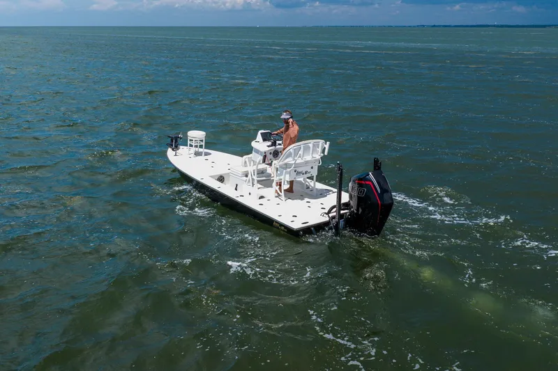 Slide: The Image of 2008 Lake & Bay Boca Grande 20 boat cruising on open water. - 17