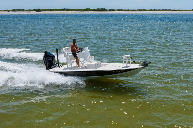 Slide: The Image of 2008 Lake & Bay Boca Grande 20 boat cruising on open water. - 19