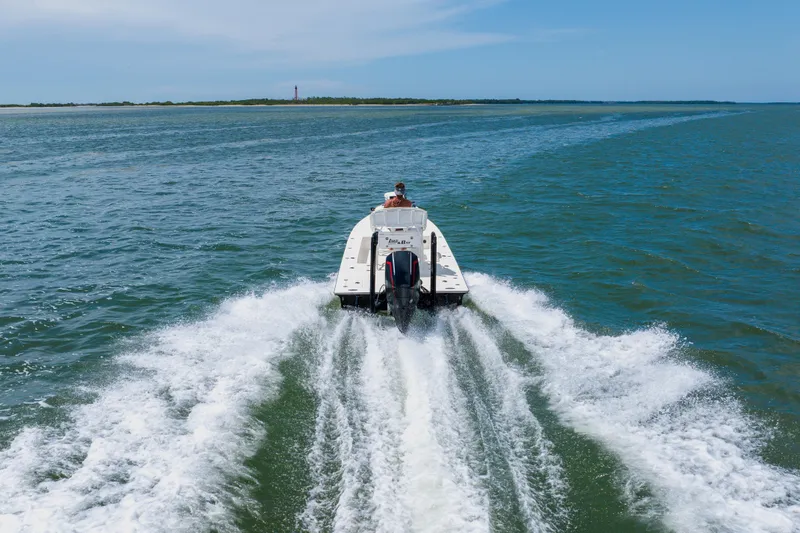 Slide: The Image of 2008 Lake & Bay Boca Grande 20 boat cruising on open water, leaving a wake behind. - 24