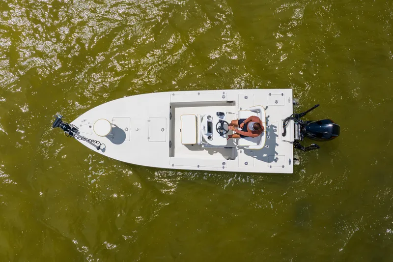 Slide: The Image of Overhead view of 2008 Lake & Bay Boca Grande 20 boat on green water. - 26