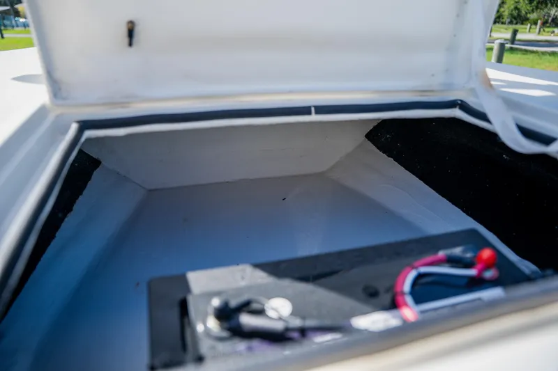 Slide: The Image of Open storage compartment of 2008 Lake & Bay Boca Grande 20 boat. - 33
