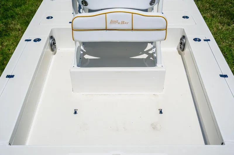 Slide: The Image of 2008 Lake & Bay Boca Grande 20 boat interior with seating and storage compartments. - 38