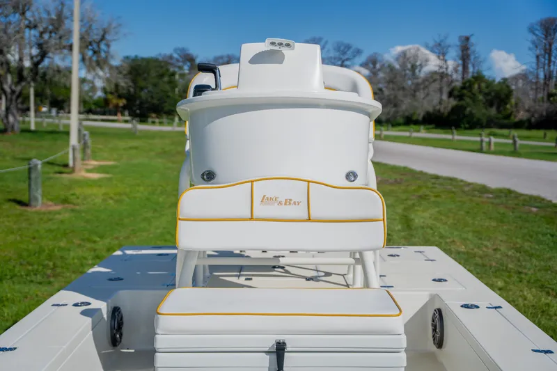 Slide: The Image of 2008 Lake & Bay Boca Grande 20 boat, rear view, on grassy area with clear sky. - 41