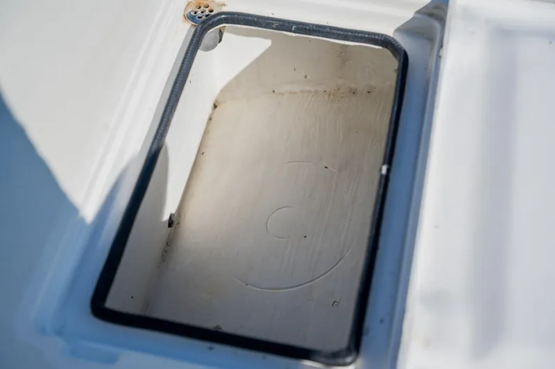 Slide: The Image of Open storage compartment on 2008 Lake & Bay Boca Grande 20 boat. - 54