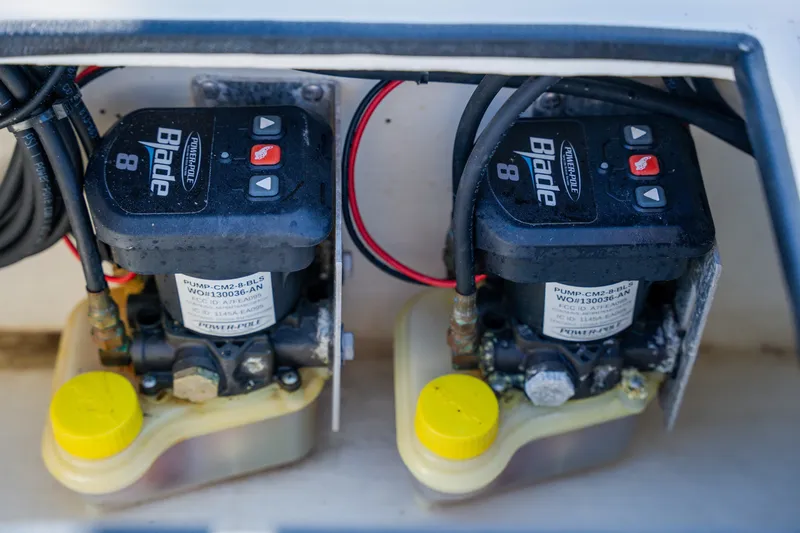 Slide: The Image of Twin Power-Pole Blade 8 pumps in a 2008 Lake & Bay Boca Grande 20 boat. - 57