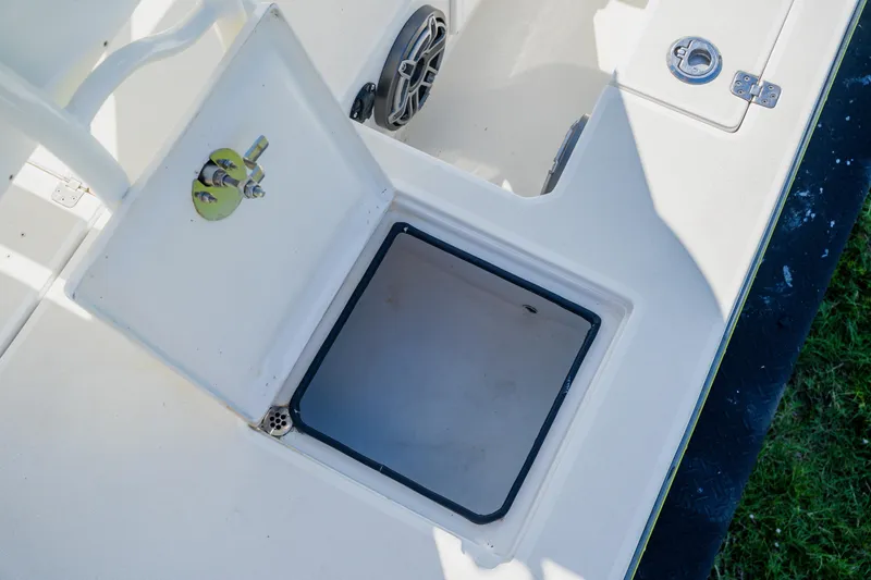 Slide: The Image of 2008 Lake & Bay Boca Grande 20 boat storage compartment with open hatch. - 59