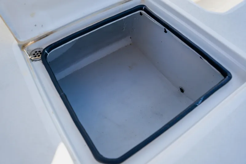 Slide: The Image of Open storage compartment on 2008 Lake & Bay Boca Grande 20 boat. - 60