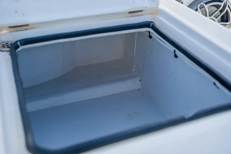 Slide: The Image of Open storage compartment on a 2008 Lake & Bay Boca Grande 20 boat. - 62