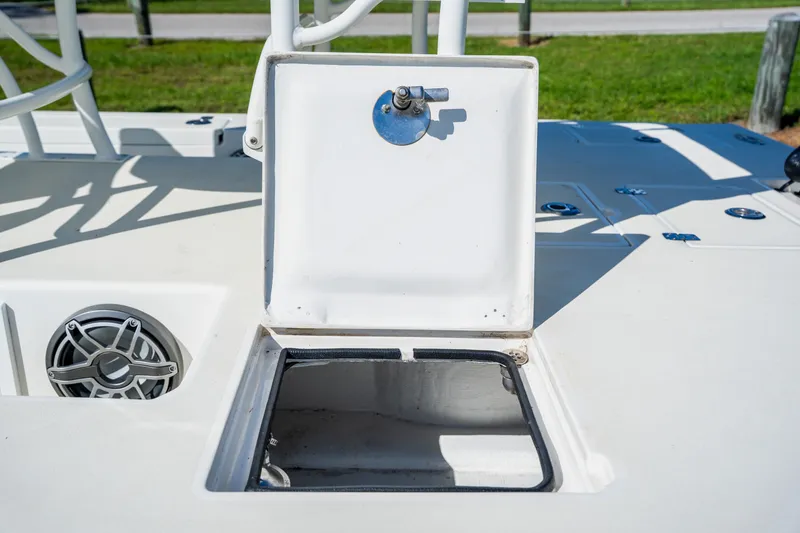 Slide: The Image of Open storage compartment on 2008 Lake & Bay Boca Grande 20 boat deck. - 63