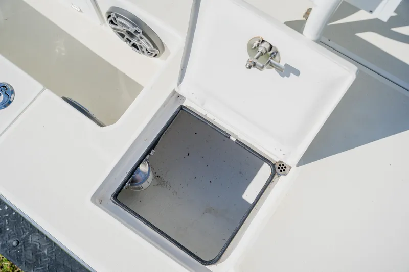 Slide: The Image of Open storage compartment on 2008 Lake & Bay Boca Grande 20 boat deck. - 65