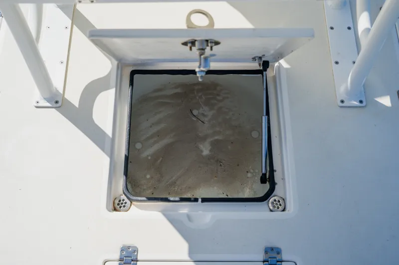 Slide: The Image of Open hatch on 2008 Lake & Bay Boca Grande 20 boat, showing interior compartment. - 66