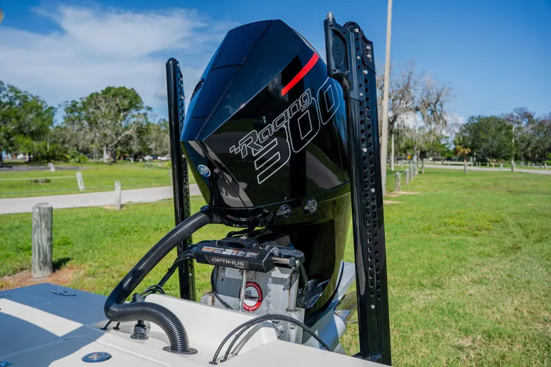 Slide: The Image of 2008 Lake & Bay Boca Grande 20 with Racing 300 engine in a grassy park setting. - 71