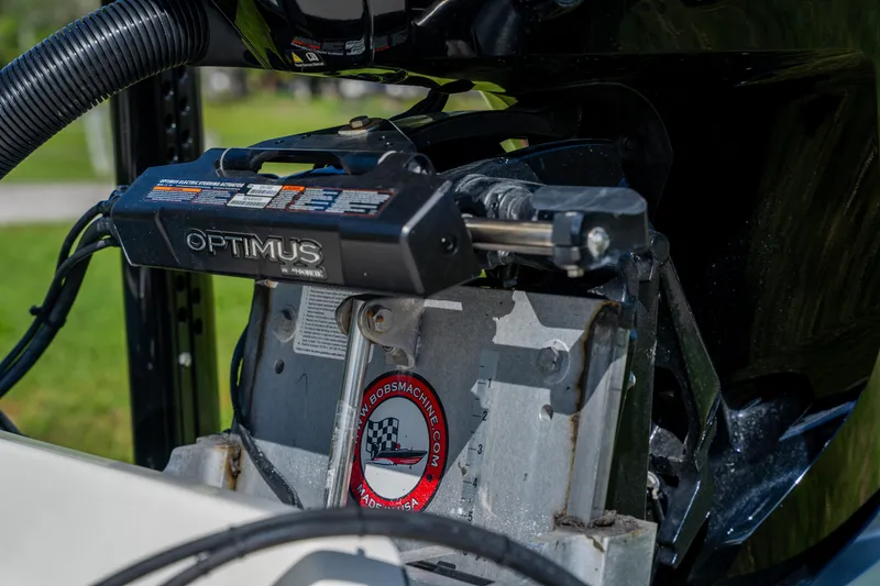 Slide: The Image of Close-up of 2008 Lake & Bay Boca Grande 20 boat steering mechanism. - 72